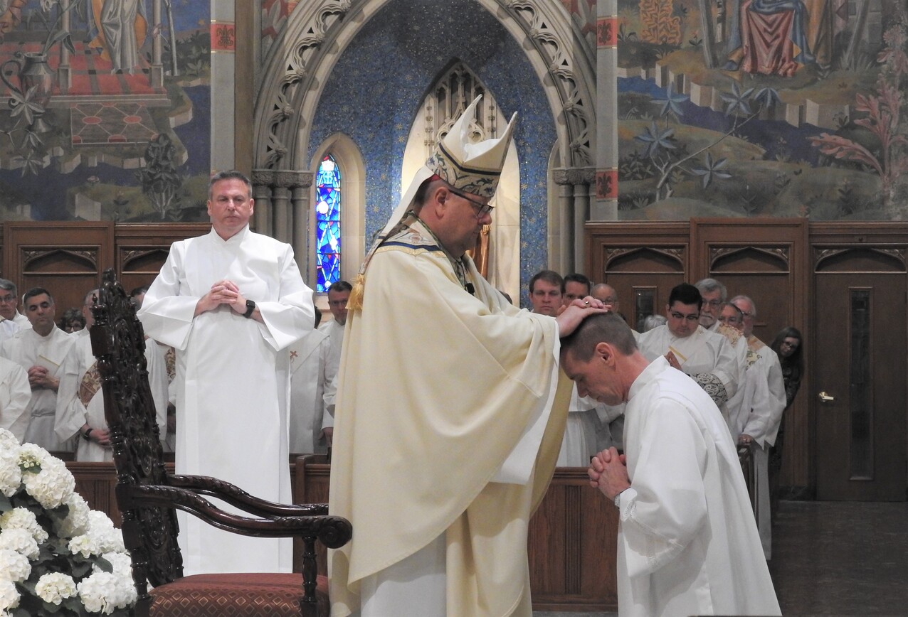 tells new deacons they are a bridge between secular, sacred life